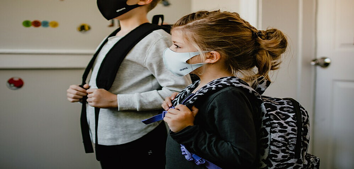 boy and girl with masks on