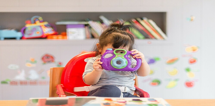 kid playing with toys