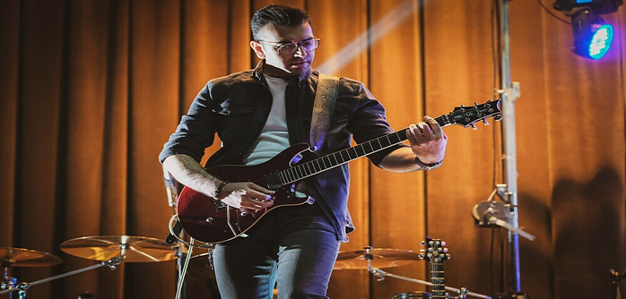 man playing guitar