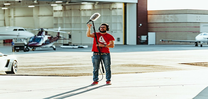 man with large microphone