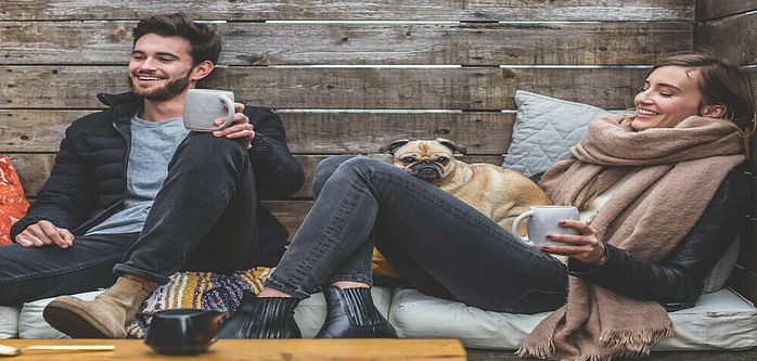 people smiling and drinking coffee